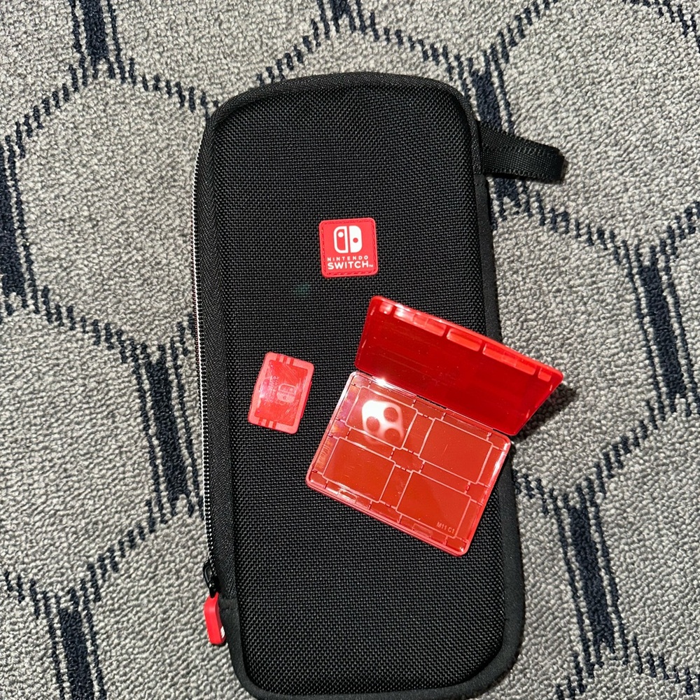Nintendo Black and Red Switch Case with Game Holder